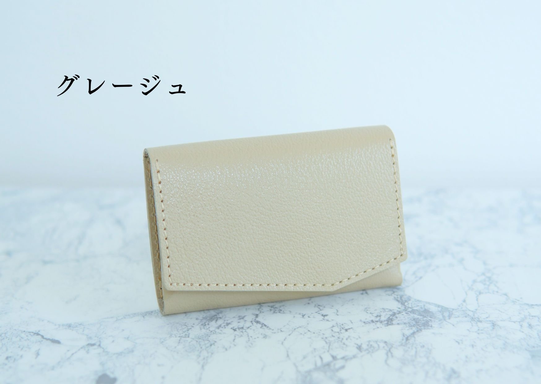 独自構造でまるでお札・摩擦レス。ミニ財布の悩みを全て解決する