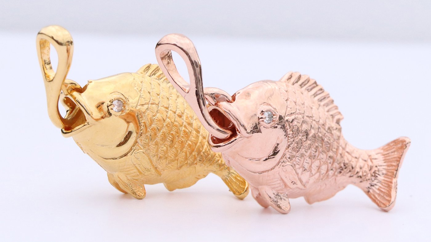 縁起物開運岩上鯛釣り金属製 魚を持つ人物像 約20cm