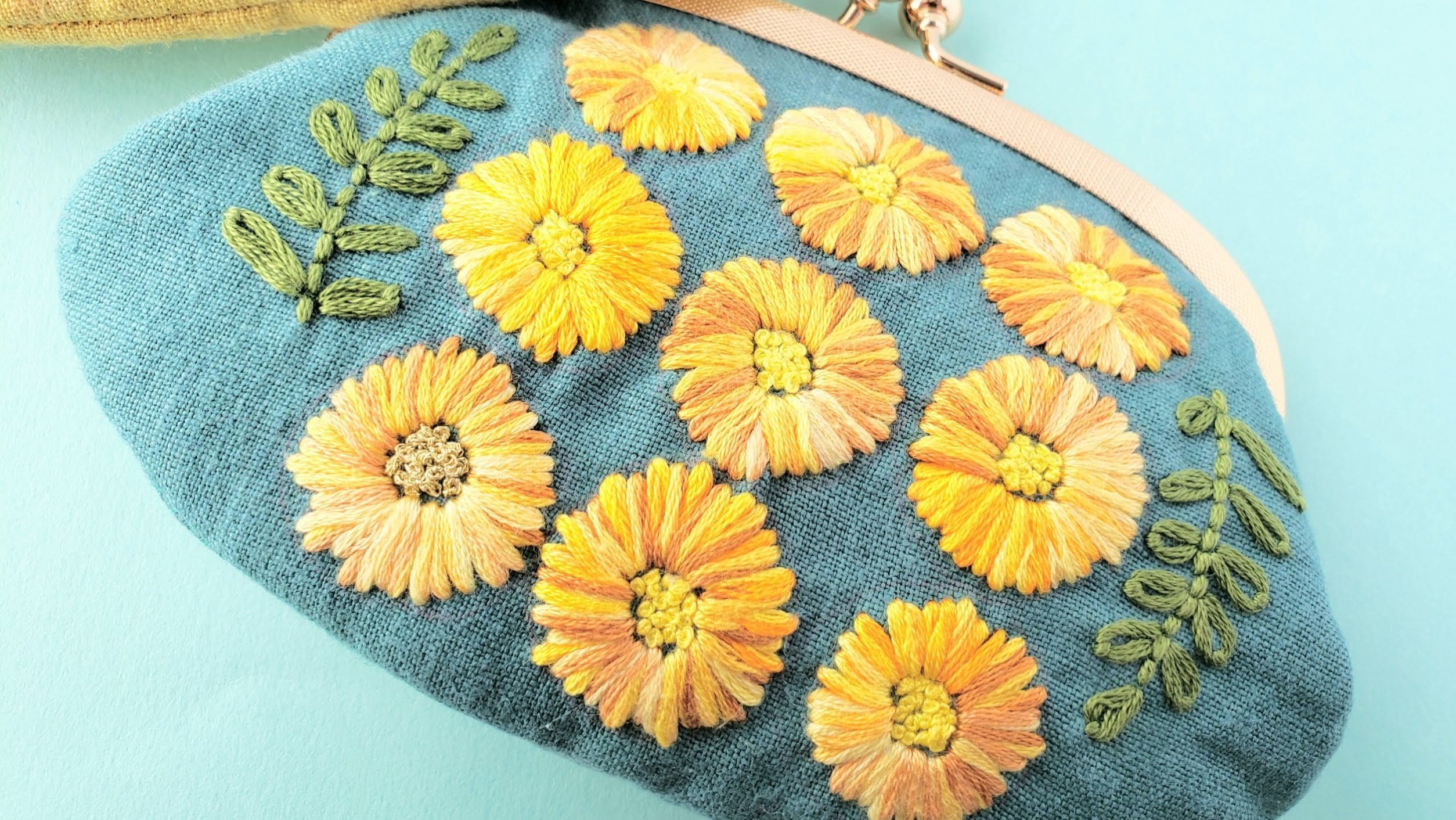 日常を彩る、刺繍のがま口バッグとポーチ｜Creema SPRINGS