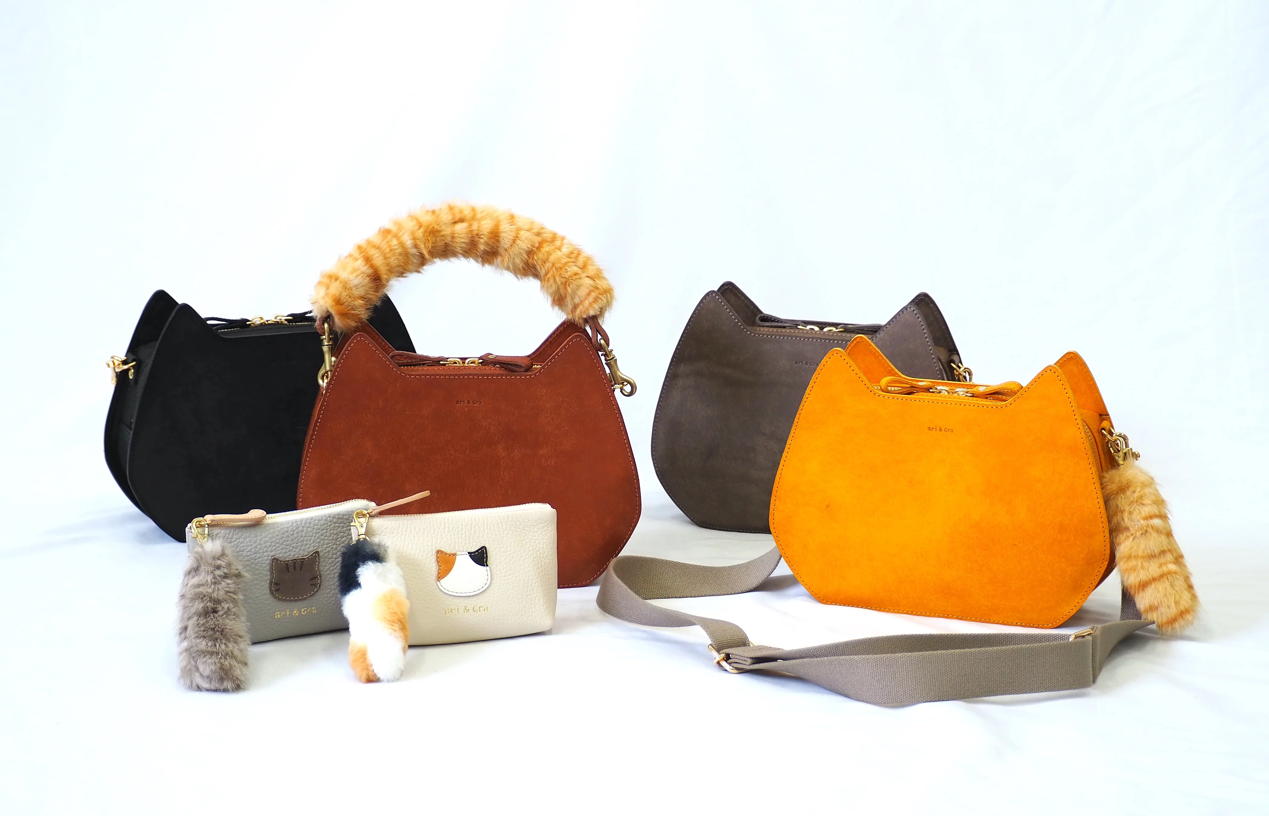 日常使いできる上品さ。さりげなく猫を感じる。職人が作る本革